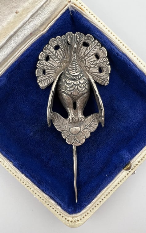 Antique Silver Peacock Design Shawl Pin Stick Pin: Antique Silver Peacock Design Shawl Pin Stick Pin. Antique chased silver peacock design tupu design pin. Measures just over 3.5 inches in length. Weighs approximately 32.5 grams.