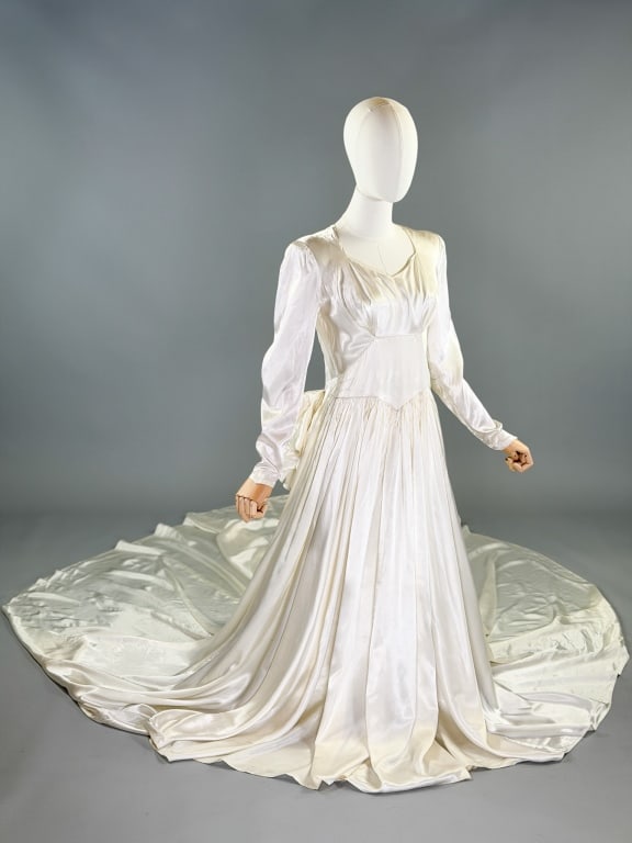 Vintage 1940s Rayon Satin Trained Wedding Gown: Vintage 1940s Rayon Satin Trained Wedding Gown having dramatic court train. Missing zip closure at side as shown. Measuring 34-36 inch bust, 28 inch waist, 55 front length, 25 inch sleeve length. Gene