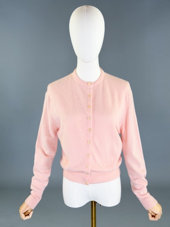 Vintage 1950s Cashmere Knit Cardigan Sweater Top: Vintage 1950s Cashmere Knit Cardigan Sweater Top having button front closure with stretch throughout. Measuring 38-46 inch bust, 27-38 inch waist, 21 inches long, 22 inch sleeve length. General wear a