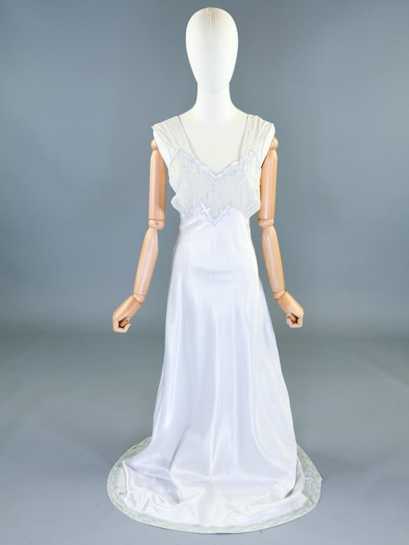 Vintage 1940s Satin Lace Slip Dress Night Gown: Vintage 1940s Rayon Satin Lace Slip Dress Night Gown having lace detail at bust, bias cut throughout with stretch, labeled Miss New York, marked size 36. Measuring 36-40 inch bust, 26-36 inch waist, 6