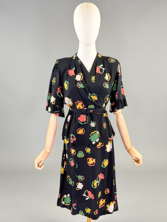 Vintage 1940s Cold Rayon Floral Print Day Dress: Vintage 1940s Cold Rayon Floral Print Day Dress having peplum at waist with removable belt, no closures slides over head. Measuring 42 inch bust, 36 inch waist, 39 inches long, 13 inch sleeve length. 