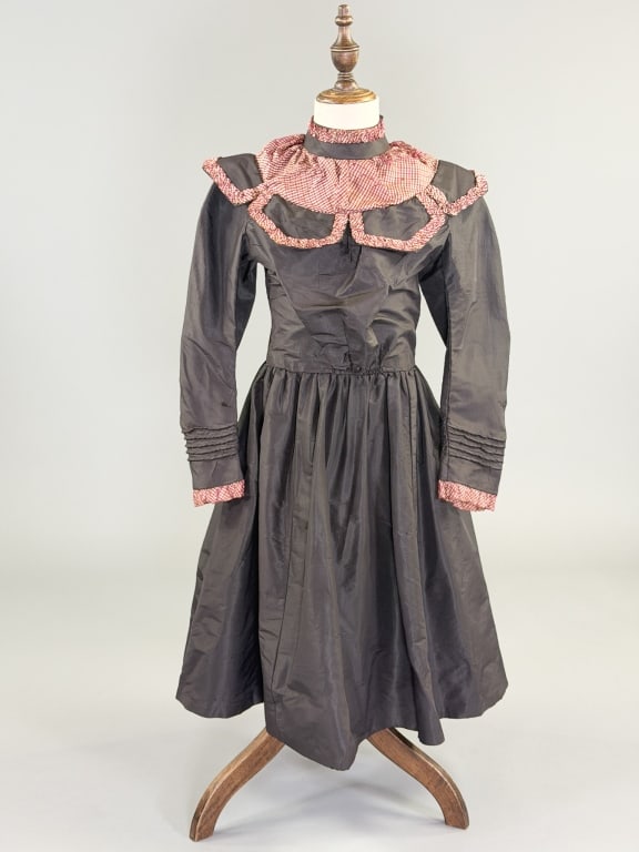Antique Victorian 1870s Kids Silk Plaid Dress: Antique Victorian 1870s Kids Silk Plaid Dress having petal details at neck with ruched front and hook closure at center back, fully lined. Measuring 28 inch chest, 24 inch waist, 34 inches long, 20 in