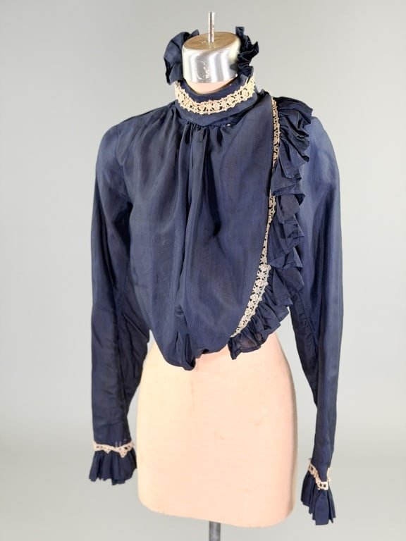 Antique Edwardian 1900s Silk Ruffle Bodice Top: Antique Edwardian 1900s Silk Ruffle Lace Bodice Top having ruffled detail down front with hook closure, boned at waist. Measuring 36 inch bust, 26 inch waist, 18 inches long, 26 inch sleeve length. Ge