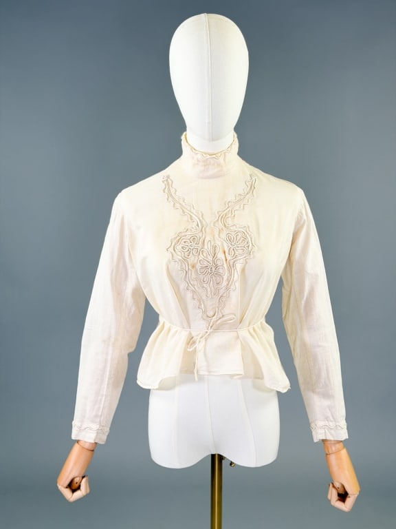 Antique Edwardian 1900s Soutache Cotton Blouse: Antique Edwardian 1900s Soutache Cotton Blouse having soutache embroidery at front with button back closure and tie at waist. Measuring 36 inch bust, 18 inches long, 20 inch sleeve length.