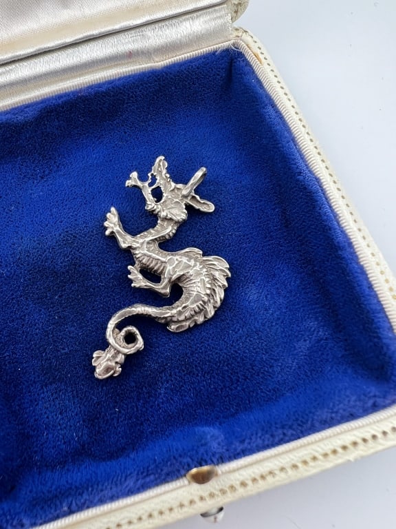 Sterling Silver Figural Dragon Necklace Pendant: Sterling Silver Figural Dragon Necklace Pendant. Hallmarked faintly on the back. Measures just under 2 inches in length.