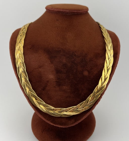 Gold Over Sterling Silver Italian Braided Necklace: Gold Over Sterling Silver Italian Braided Necklace. Stamped 925 and ITALY. Made with four braided strands. Measures approximately 23.75 inches in length.
