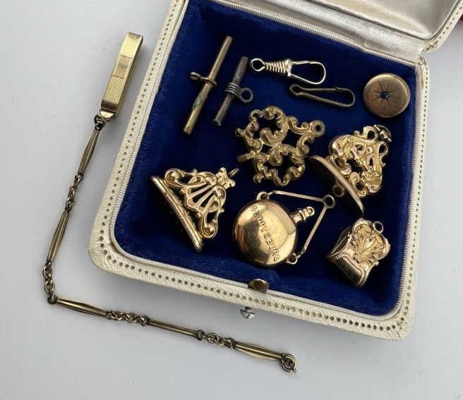 Collection of Antique Watch Fobs & Components: Collection of Antique Watch Fobs & Components. Including gold filled and gilt metal. Victorian and Art Nouveau style. See photos with quarter for size / scale.