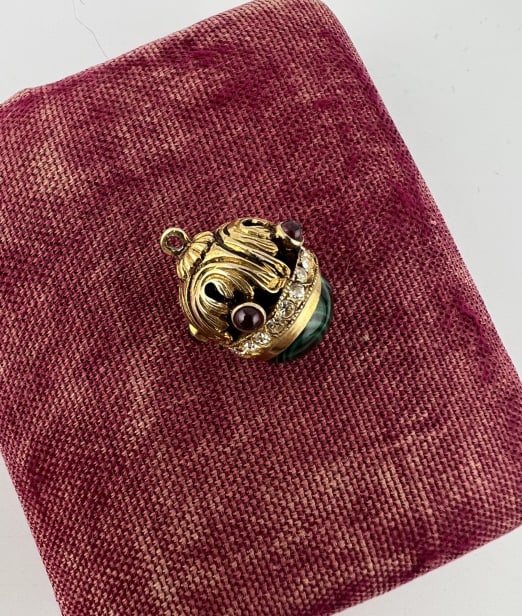 Estate Gold Sterling Malachite Russian Egg Charm: Estate Gold Over Sterling Silver & Malachite Russian Style Egg Charm / Necklace Pendant. Unmarked. Tests as sterling silver, set with a cabochon malachite stone. Measures approximately .75 of an inch 