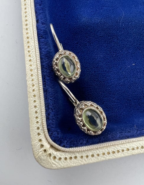 Pair Sterling Silver & Cabochon Citrine Earrings: Pair Sterling Silver & Cabochon Citrine Earrings. Hallmarked. Each measures just under 1 inch in length