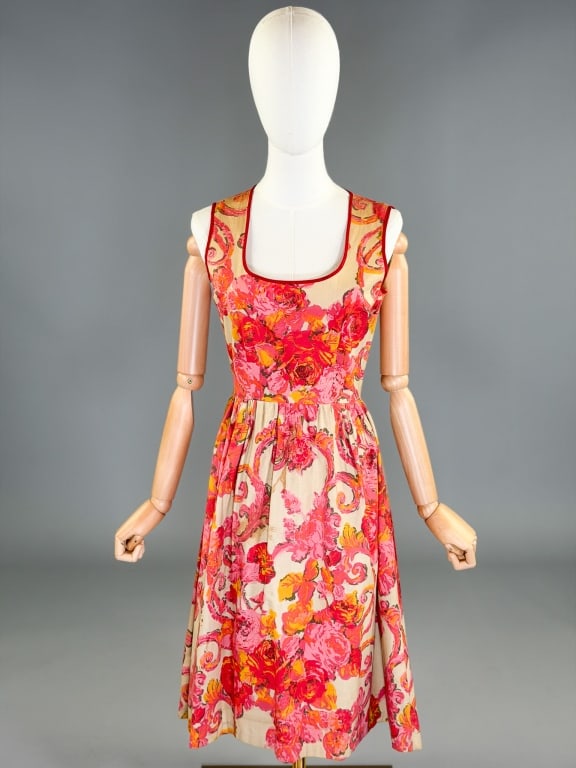 Vintage 1960s Floral Printed Cotton Day Dress: Vintage 1960s Floral Printed Cotton Day Dress having back zip closure. Measuring 36 inch bust, 26 inch waist, 40 inches long. General wear as shown throughout.