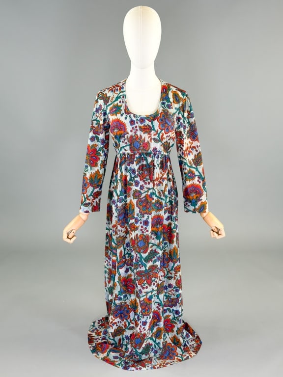 Vintage 1970s Nylon Paisley Print Knit Dress: Vintage 1970s Nylon Paisley Print Knit Dress having ruched empire waist with center back zip closure. Measuring 34-40 inch bust, 28 inch waist, 51 inches long, 20 inch sleeve length. General wear as s