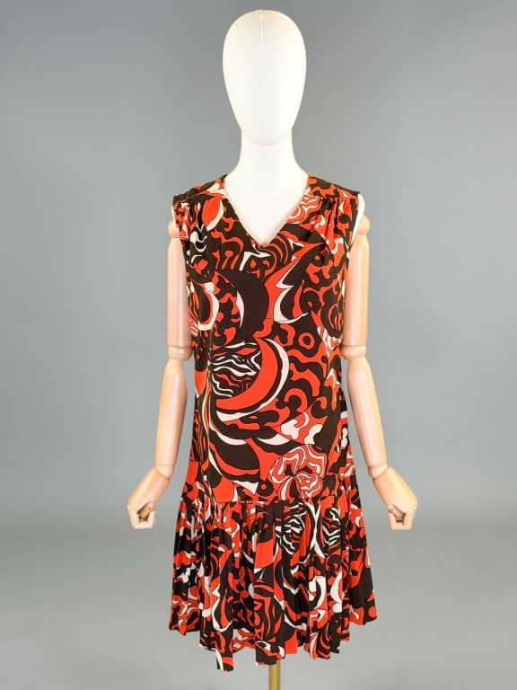 Vintage 1960s Psychedelic Knit Drop Waist Dress: Vintage 1960s Psychedelic Knit Drop Waist Dress having back zip closure. Measuring 40 inch bust, 40 inch waist, 36 inches long. General wear as shown throughout.