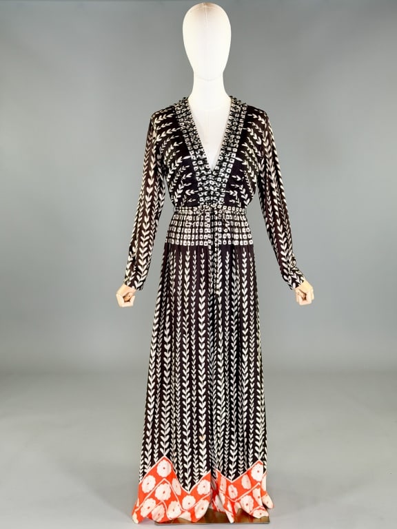 Vintage 1970s Embellished Printed Palazzo Jumpsuit: Vintage 1970s Embellished Printed Palazzo Jumpsuit. Measuring 36-38 inch bust, 30 inch waist, 57 inches long, 23 inch sleeve length, having general wear and spots throughout as shown.