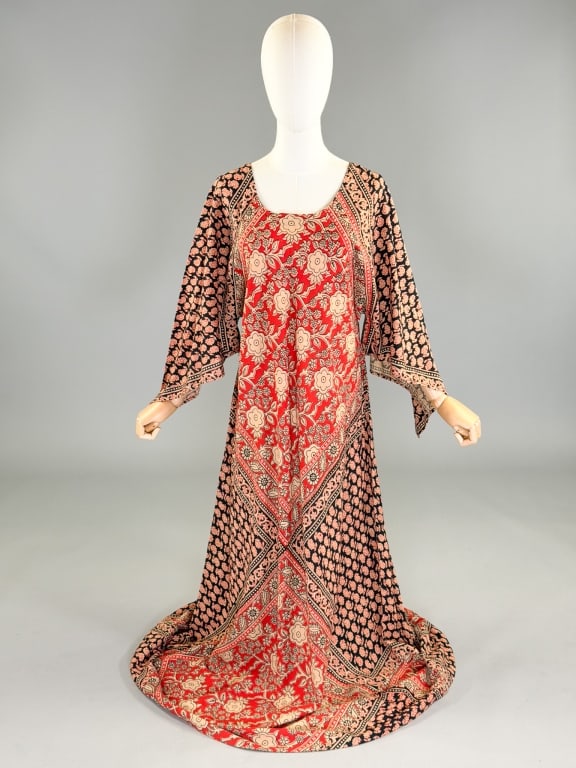 Vintage 1970s Boho Block Print Hippy Maxi Dress: Vintage 1970s Boho Block Print Hippy Maxi Dress having fluttered sleeves. Marked, "One Size Fits All." Measuring free bust & waist, 57 inches long, 25 inch sleeve length.
