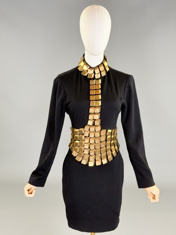 Vintage 2000s CD Greene Embellished Knit Dress: Vintage 2000s CD Greene Embellished Knit Dress having back zip closure. Measuring 32-38 inch bust, 28-32 inch waist, 34 inches long, 22 inch sleeve length. Missing embellishments and small holes throu