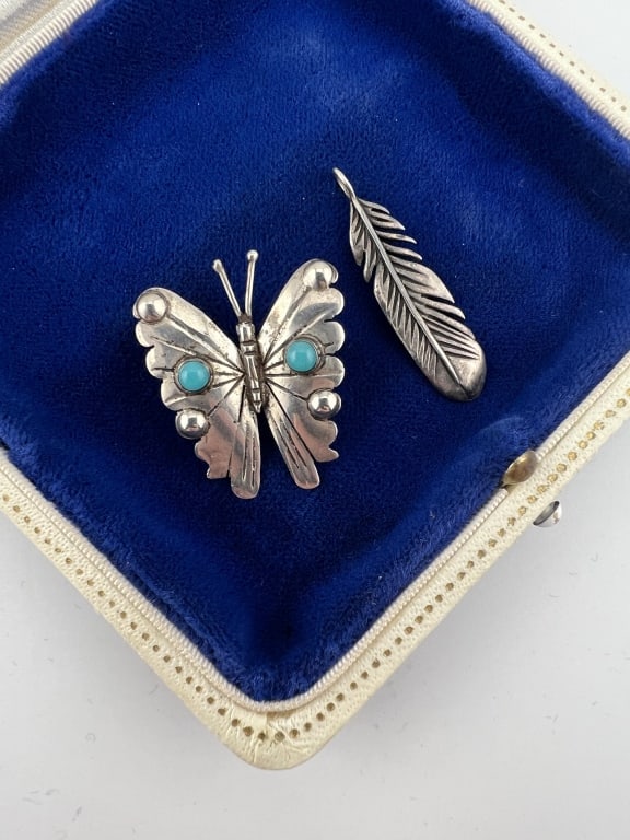 Native American Sterling Silver Brooch & Pendant: Native American Sterling Silver Brooch & Pendant. Butterfly brooch set with turquoise and feather design motif necklace pendant. Brooch measures just over 1 inch in length, pendant measures just over 