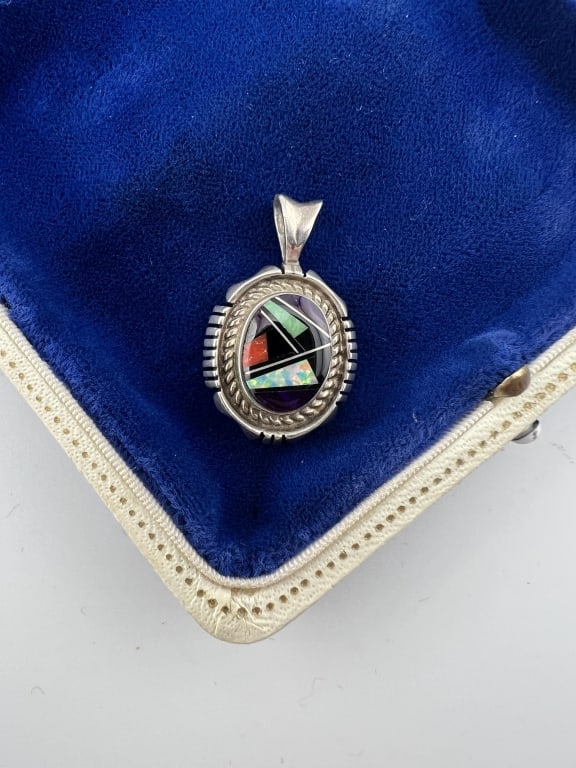 Native American Sterling Zuni Mosaic Pendant: Native American Sterling Silver Zuni Mosaic Pendant. Necklace pendant with inlaid stone. Acid tests for sterling silver, unmarked. Measures 1.25 inches in length.