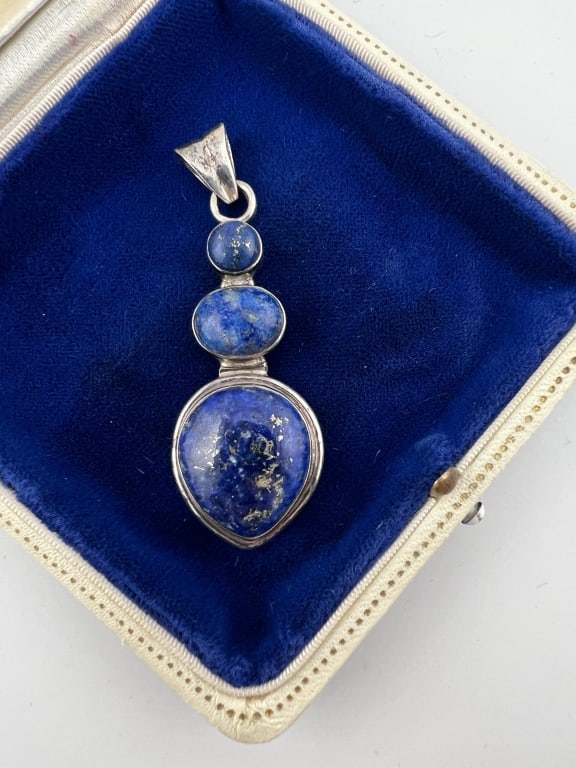 Large Scale Sterling Lapis Lazuli Necklace Pendant: Large Scale Sterling Lapis Lazuli Necklace Pendant. Sterling silver and three lapis lazuli cabochons with gold flecks / veining. Hallmarked. Measures 2.5 inches in length.