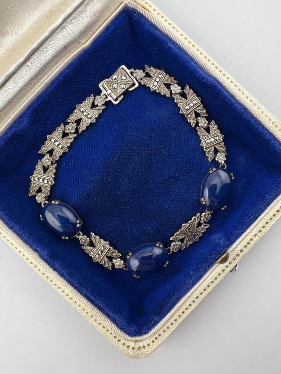 Antique Art Deco Sterling Lapis Marcasite Bracelet: Antique Art Deco Sterling Silver & Lapis Lazuli w Marcasite Bracelet. Articulated panel bracelet. Hallmarked. Measures 7.5 inches in length.