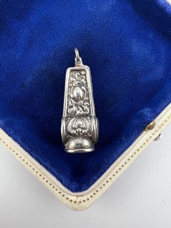 Antique Sterling Silver Cigar Cutter Fob Pendant: Antique Sterling Silver Cigar Cutter Fob Pendant. Stamped STERLING. French Rococo design elements. Measures just over 1.25 inches in length.