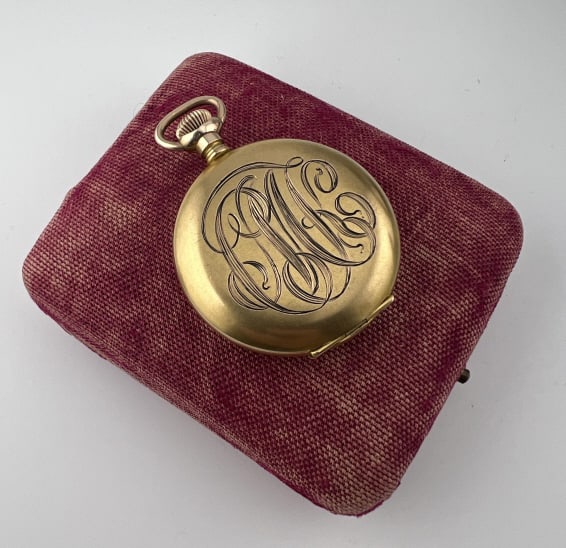 Antique Elgin 15 Jewel Gold Filled Pocket Watch: Antique Elgin 15 Jewel Gold Filled Pocket Watch. White enamel face with smaller second hand dial inset at bottom. Measures 2 inches in length.