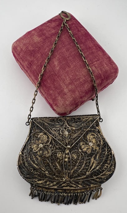 Antique Ornate Gilt Filigree Purse Pendant: Antique Ornate Gilt Filigree Purse Pendant. Hinged opening, bottom with fringe trim. Measures 6.25 inches in length.