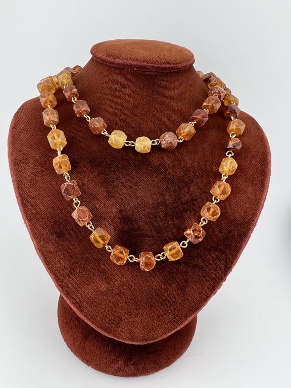 Vintage Baltic Amber Beaded Necklace Strand: Vintage Baltic Amber Beaded Necklace Strand w Gold Plate Hardware. Measures 24 inches in length.