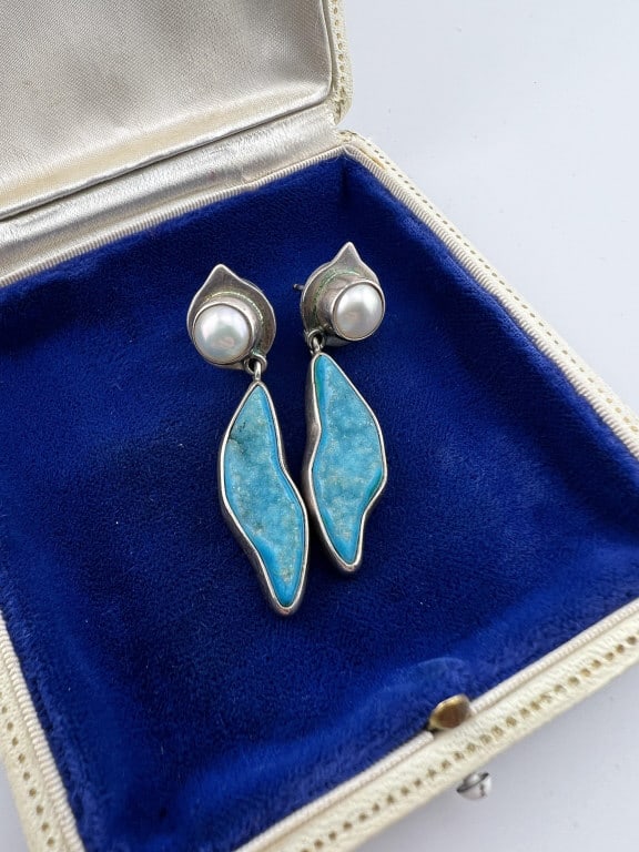 Pair Sterling Druzzy Crystal Mabe Pearl Earrings: Pair Modernist Sterling Druzzy Crystal Mabe Pearl Earrings. Hallmarked. Each measures 2 inches in length.