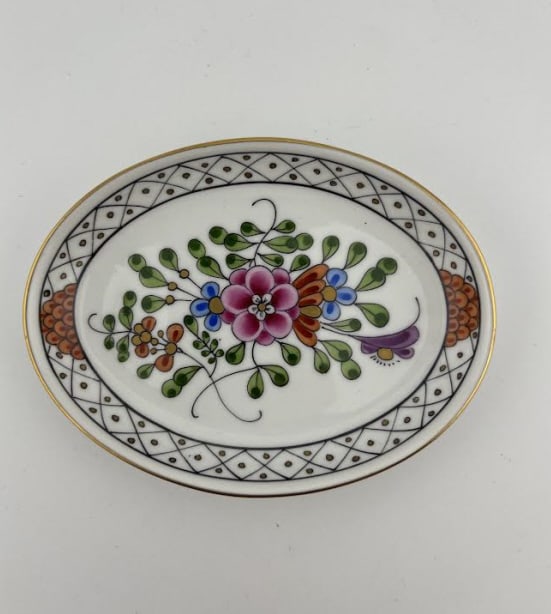 Herend Hungary Porcelain Floral Motif Oval Dish: Herend Hungary Porcelain Floral Motif Oval Dish. Signed on the bottom. Hand painted. Measures 4.75 x 3.5 inches.