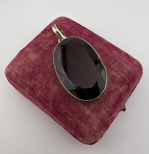Sterling & Approx 100 Carat Smoky Quartz Pendant: Sterling Silver & Approximately 100 Carat Smoky Quartz Necklace Pendant. Hallmarked. Measures 2.25 inches in length.