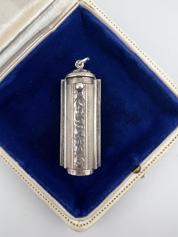 Antique 900 Silver Compact Chatelaine Pendant: Antique 900 Silver Compact Chatelaine Pendant. Lipstick compact with mirror necklace pendant / chatelaine pendant or fob. Hallmarked 900. Chased and patterned engraved exterior. Measures just over 2.2