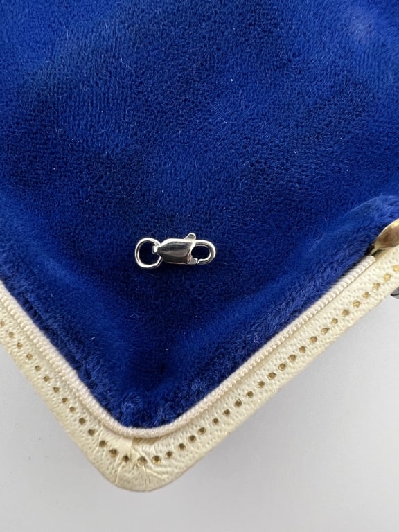 Estate 14kt White Gold Lobster Clasp: Estate 14kt White Gold Lobster Clasp. Hallmarked. Measures 1/2 an inch in length.