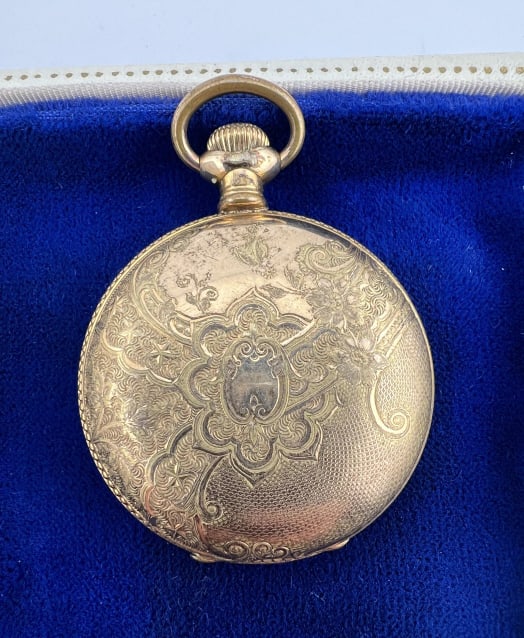 Antique Warranted 14kt Gold Pocket Watch by Bijou: Antique Warranted 14kt Gold Pocket Watch by Bijou. Antique yellow gold filled pocket watch pendant with white enamel face, marked Bijou, case marked Warranted 14K, movement marked Bijou. Measures 2 in