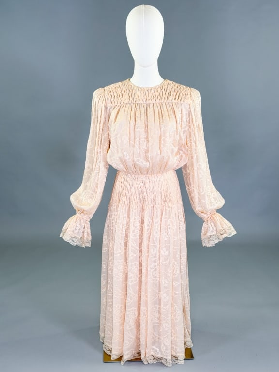 Vintage 1980s Oscar de la Renta Smocked Dress: Vintage 1980s Oscar de la Renta Smocked Dress having smocked details through yoke and waist, closing at back with snaps and hooks. Measuring 32-46 inch bust, 26 inch waist, 49 inches long, 28 inch sle