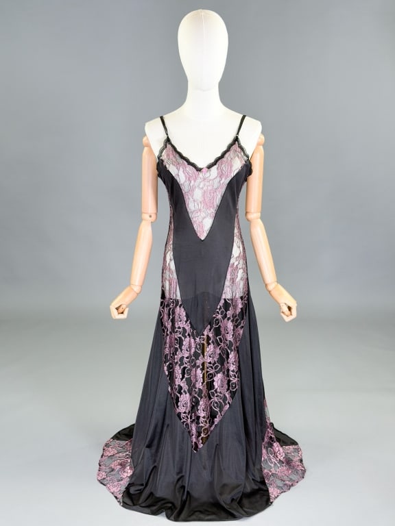 Vintage 1980s Fredericks of Hollywood Slip Dress: Vintage 1980s Fredericks of Hollywood Slip Dress having lace details throughout with stretch. Measuring 32-40 inch bust, 24-34 inch waist, 55 inches long. General wear as shown throughout.