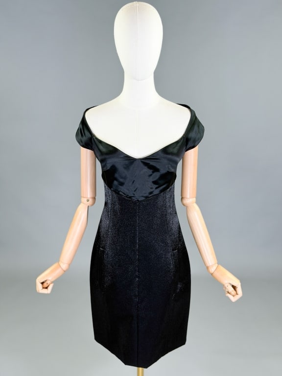 Vintage 1990s Karl Lagerfeld Satin Halter Dress: Vintage 1990s Karl Lagerfeld Satin Halter Dress having back zip closure and two front pockets. Marked size 38. Original tag attached. Measuring 34 inch bust, 28 inch waist, 39 inches long.