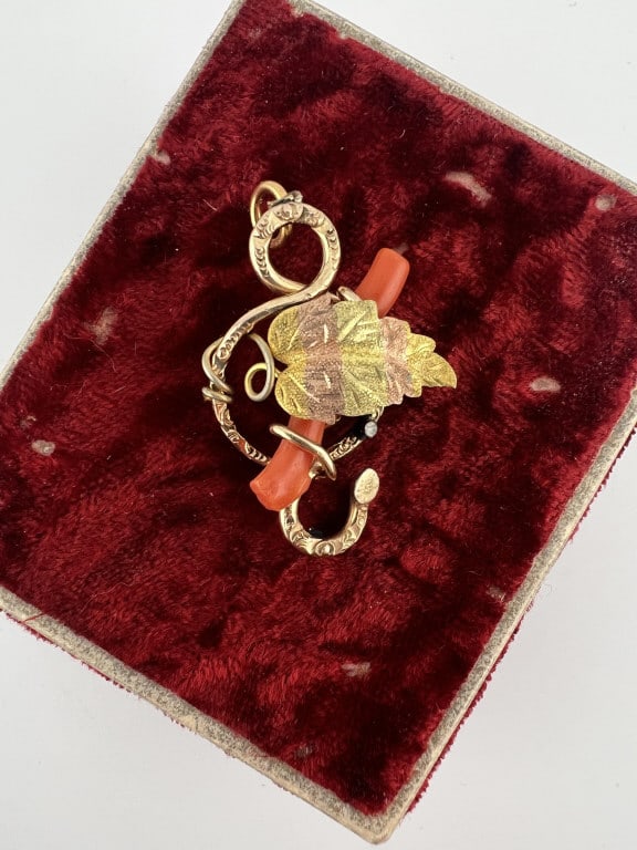 Antique 19th C Multi Color Gold & Coral Pendant: Antique 19th C Multi Color Gold & Coral Pendant. Victorian era necklace pendant with Italian coral set in gold filled mount with multi color leaf at center. Measures approximately 1.5 inches in length