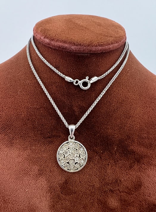 Pave Diamond Pendant on Sterling Necklace Chain: Pave Diamond Pendant on Italian Sterling Silver Necklace Chain. Clasp is hallmarked. Chain measures nearly 16 inches in length,