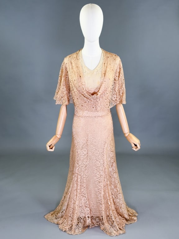Vintage 1930s Blonde Silk Lace Sequin Dress Gown: Vintage 1930s Blonde Silk Lace Sequin Dress Gown having cowl neck with embroidered floral and sequin details at front. Measuring 36-40 inch bust, 32-36 inch waist, 50 inches long, 12 inch sleeve lengt