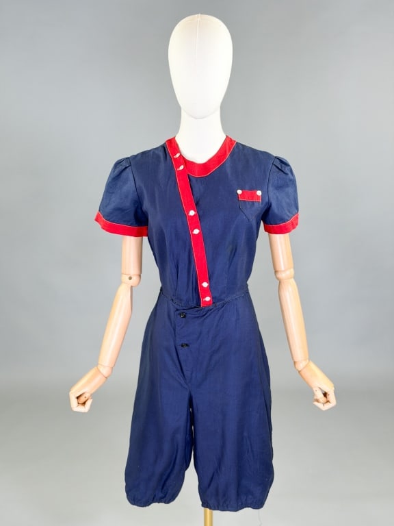 Antique 1920s Cotton Gym Suit Romper One Piece: Antique 1920s Cotton Gym Suit Romper One Piece having button closure at front. Measuring 38 inch bust, 30 inch waist, 38 inches long, 8 inch sleeve length. General wear as shown.