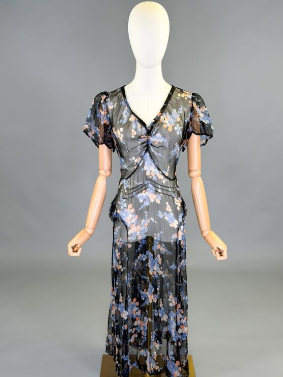 Vintage 1930s Rayon Chiffon Floral Print Dress: Vintage 1930s Rayon Chiffon Floral Print Dress having ruched and ruffled details throughout. No closure, slides overhead. Measuring 36 inch bust, 26-34 inch waist, 46 inches long, 8 inch sleeve length