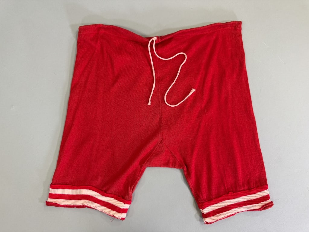 Antique 1920s Cotton Knit Bathing Suit Swim Shorts: Antique 1920s Cotton Knit Bathing Suit Swim Shorts having adjustable tie at waist. Measuring 32-40 inch waist, 13 inch rise, 18 inches long. General wear as shown throughout.