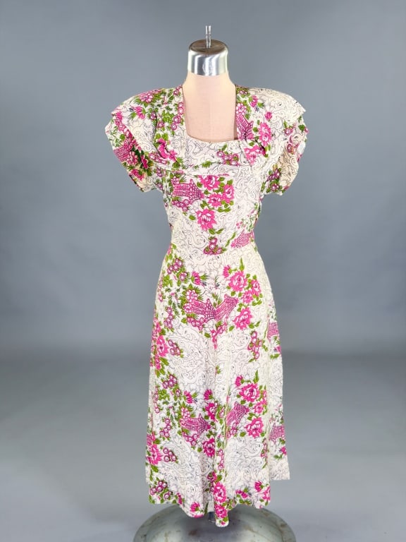 Vintage 1940s Floral Print Silk Day Dress: Vintage 1940s Floral Print Silk Day Dress having side zip closure. Measuring 34 inch bust, 26 inch waist, 41 inches long, 4 inch sleeve length. General wear as shown throughout.