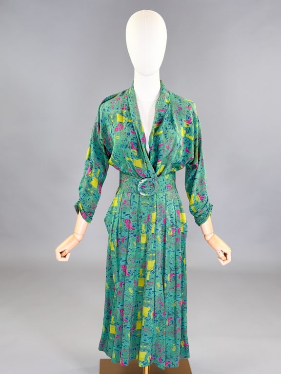Vintage 1940s Figural Printed Silk Day Dress: Vintage 1940s Figural Printed Silk Day Dress having side zip closure and belt at waist. Measuring 34 inch bust, 26 inch waist, 43 inches long, 15 inch sleeve length. General wear as shown throughout.