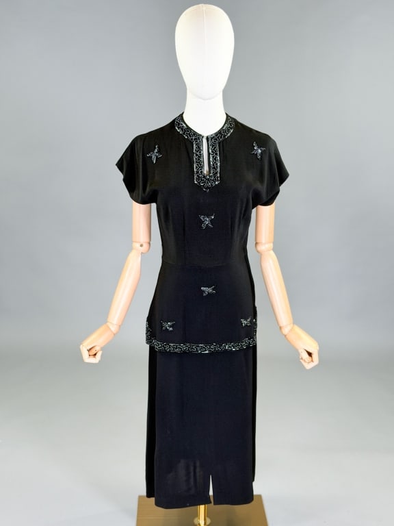 Vintage 1940s Rayon Crepe Beaded Dress: Vintage 1940s Rayon Crepe Beaded Dress having side zip closure and beading throughout. Measuring 34 inch bust, 26 inch waist, 44 inches long. General wear as shown throughout.