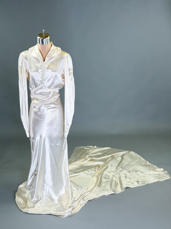 Vintage 1940s Rayon Satin Lace Bow Wedding Gown: Vintage 1940s Rayon Satin Lace Bow Wedding Bridal Gown having button front closure, bias cut throughout with train at back. Measuring 34-38 inch bust, 26-30 inch waist, 60 inch front length, 96 inch b
