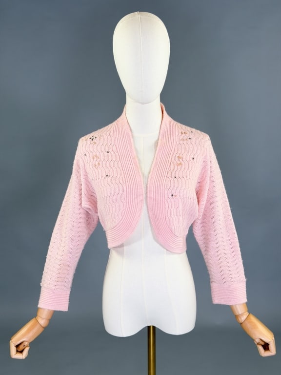 Vintage 1950s Beaded Rhinestone Knit Bolero Top: Vintage 1950s Beaded Rhinestone Knit Bolero Top having free bust and waist, with stretch throughout. Measuring 17 inches long, 18 inch sleeve length. General wear as shown throughout.