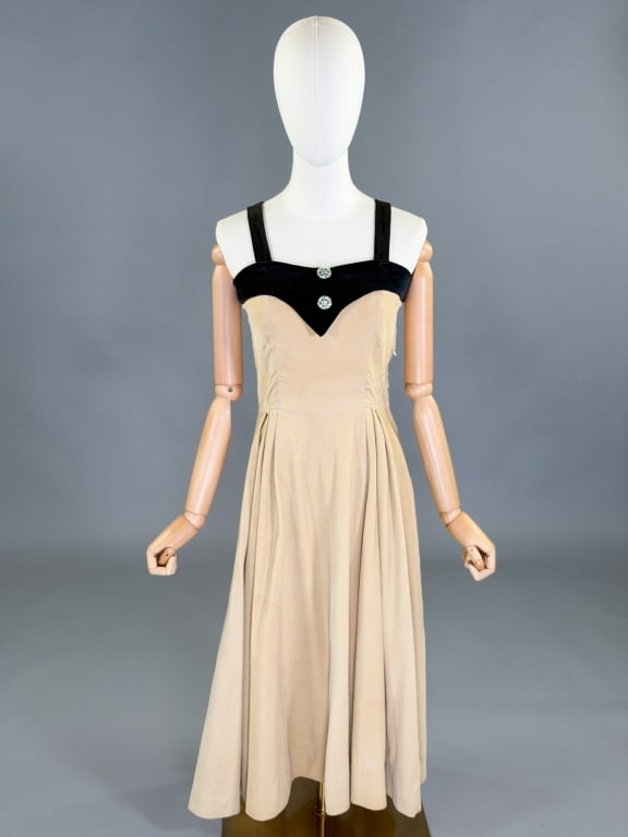 Vintage 1950s Corduroy Velvet Fit & Flare Dress: Vintage 1950s Corduroy Velvet Fit & Flare Dress having side zip closure. Measuring 34 inch bust, 26 inch waist, 46 inches long. General wear as shown throughout.
