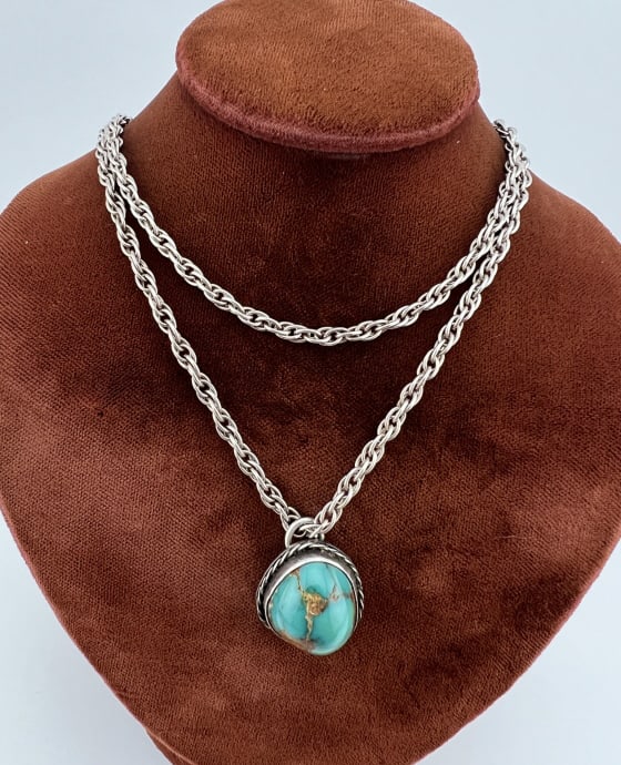Vintage Native American Sterling Turquoise Pendant: Vintage Native American Sterling Turquoise Necklace Pendant on Chain. Pendant tests for sterling silver, chain may be plated. Chain measures just over 24 inches in length.