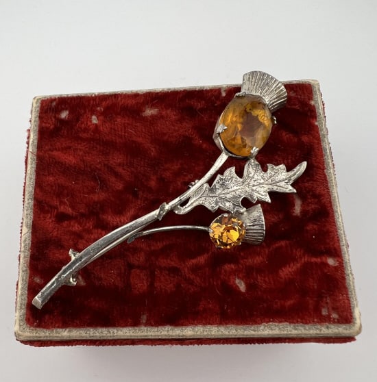 Sterling & Citrine Crystal Scottish Thistle Brooch: Vintage Sterling Silver & Citrine Crystal Scottish Thistle Brooch. Hallmarked on the back. Measures 3 inches in length.